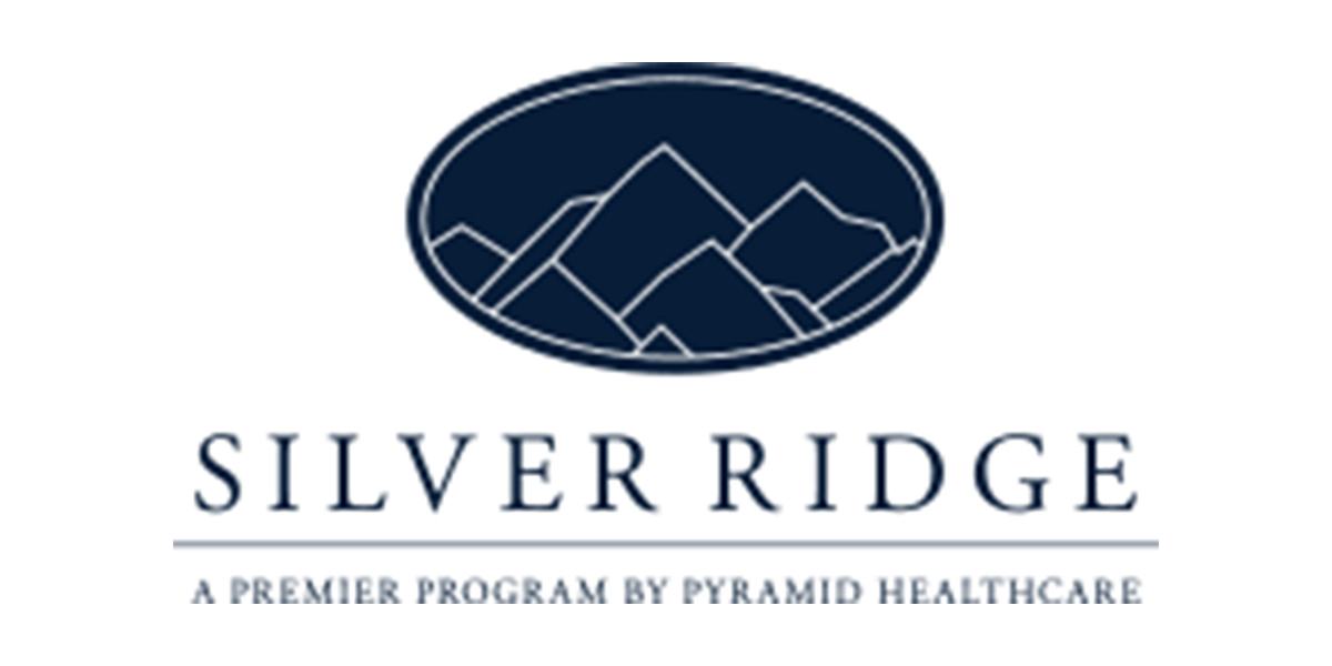 A logo of silver ridge, the program by pyramid realty.