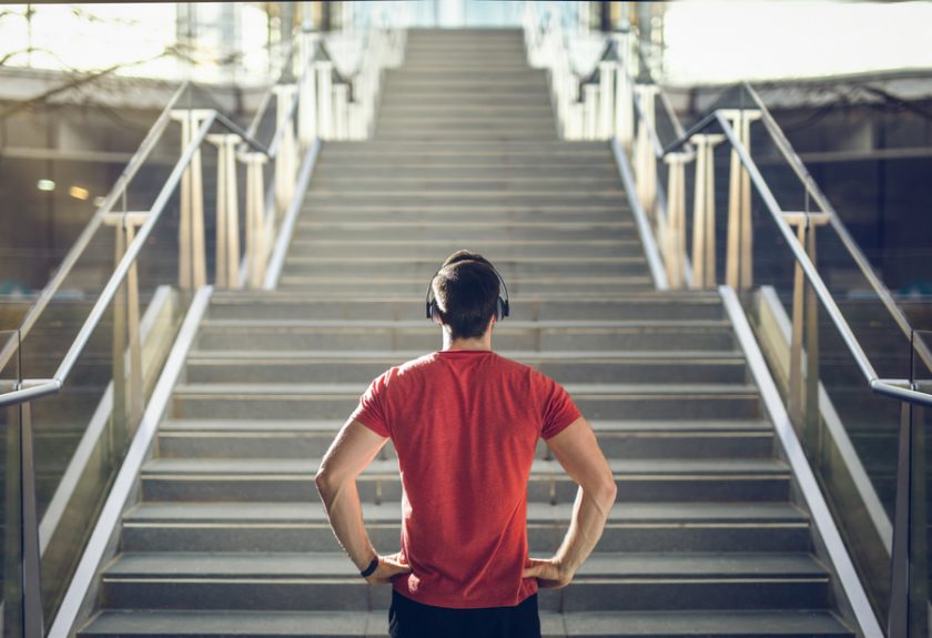 A man standing on top of some stairs