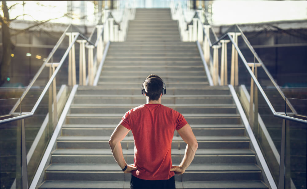 A man standing on top of some stairs