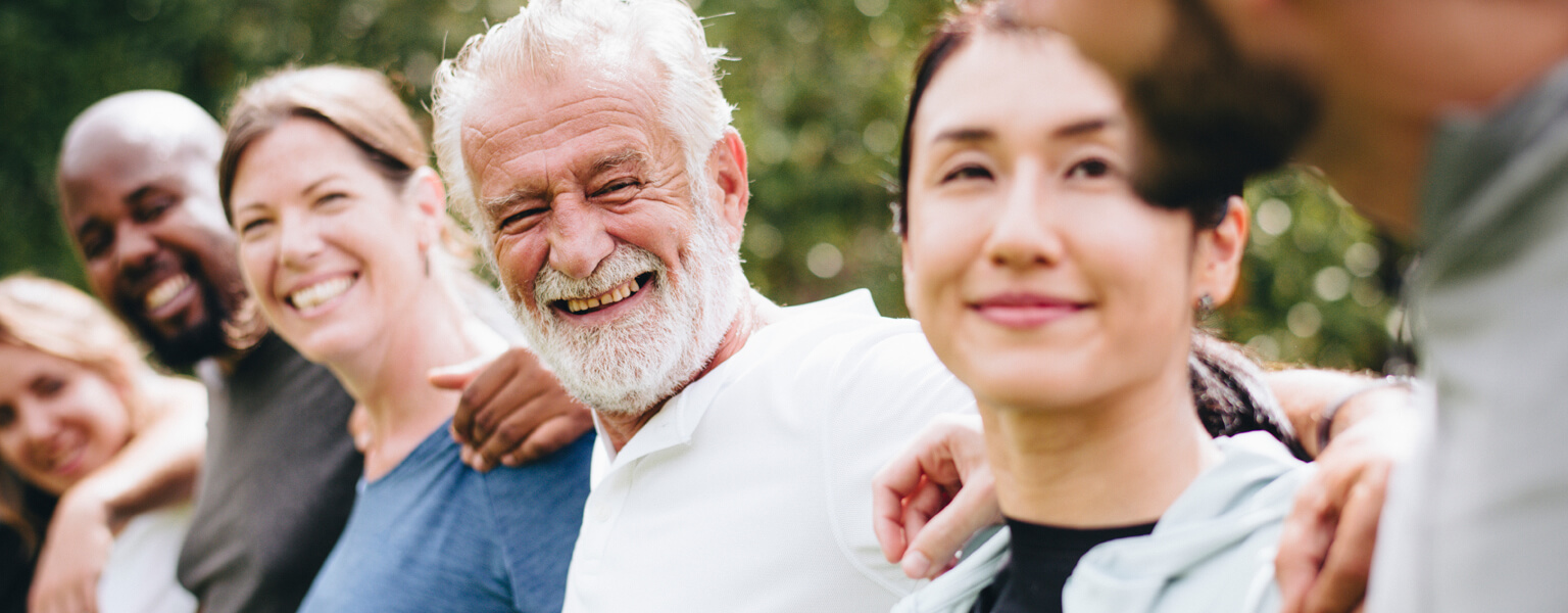 A man and woman smiling for the camera.